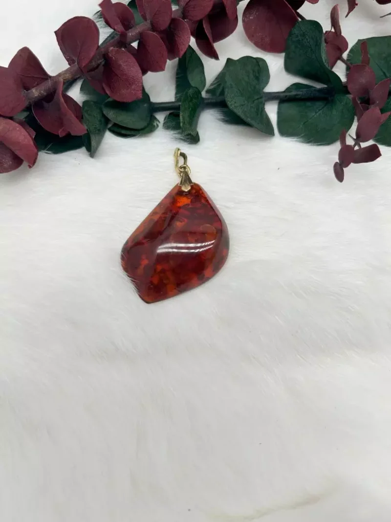 deep reddish brown amber pendant